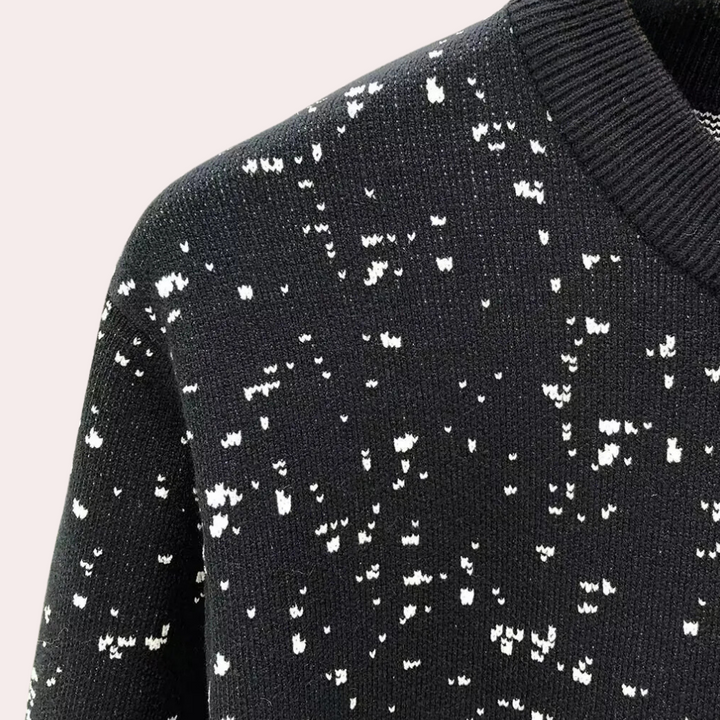 Schwarzer Strickpullover mit weißem Muster, Rundhalsausschnitt, Baumwolle, modisch, warm.