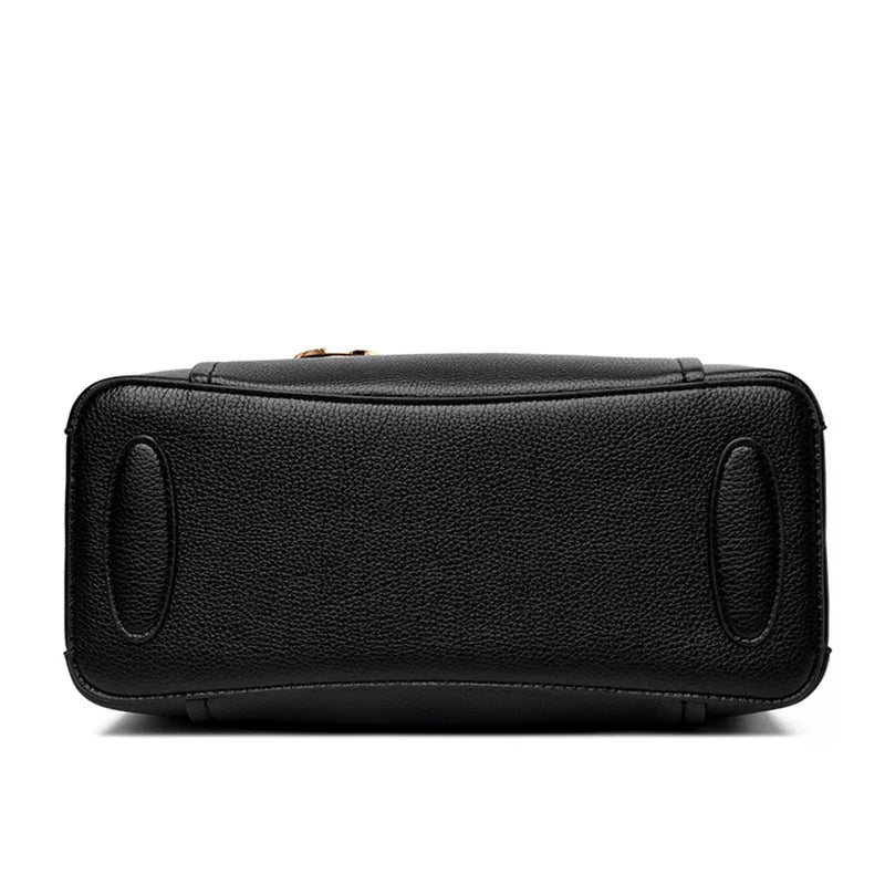 Schwarze Lederhandtasche, rechteckig, mit goldfarbenem Reißverschluss, elegante Damenmode.