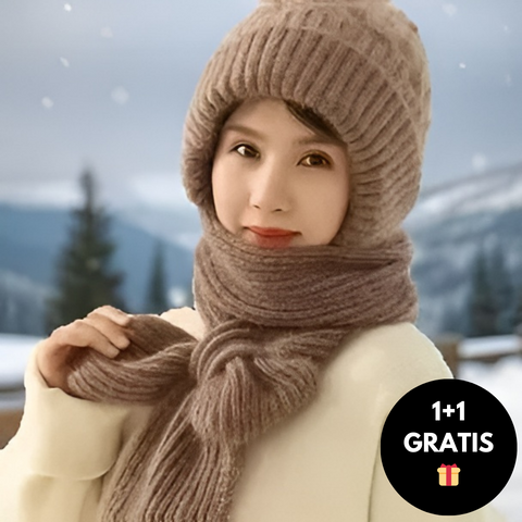 Frau mit braunem Strickmütze und Schal im Schnee, Wintermode, 1+1 Gratis Angebot.