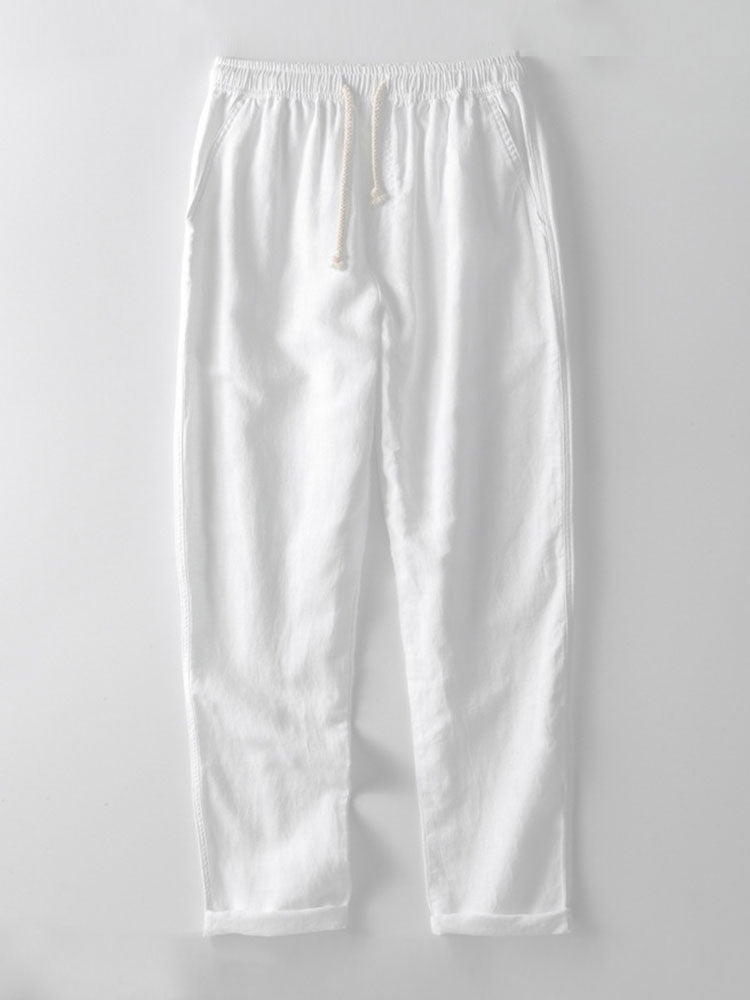 Weiße Leinenhose mit Kordelzug, lässig, bequem, ideal für Sommermode, Herrenbekleidung.