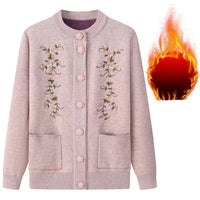 Damen Strickjacke rosa, florales Muster, Knöpfe, Taschen, warm, Herbstmode, elegant.