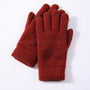 Rote Strickhandschuhe aus Wolle, warm, wintertauglich, modisch, Damenaccessoire.