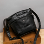 Schwarze Damen-Ledertasche, Crossbody, modisch, große Kapazität, Retro-Design, Schulterriemen.