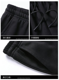 Schwarzes Herren-Trainingsanzug-Set, Sweatshirt und Jogginghose, Streetwear, Hip-Hop-Stil.