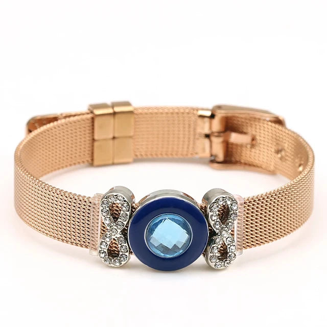 Roségoldenes Armband mit blauem Stein, Unendlichkeitssymbol, Damenmode, elegantes Schmuckdesign.