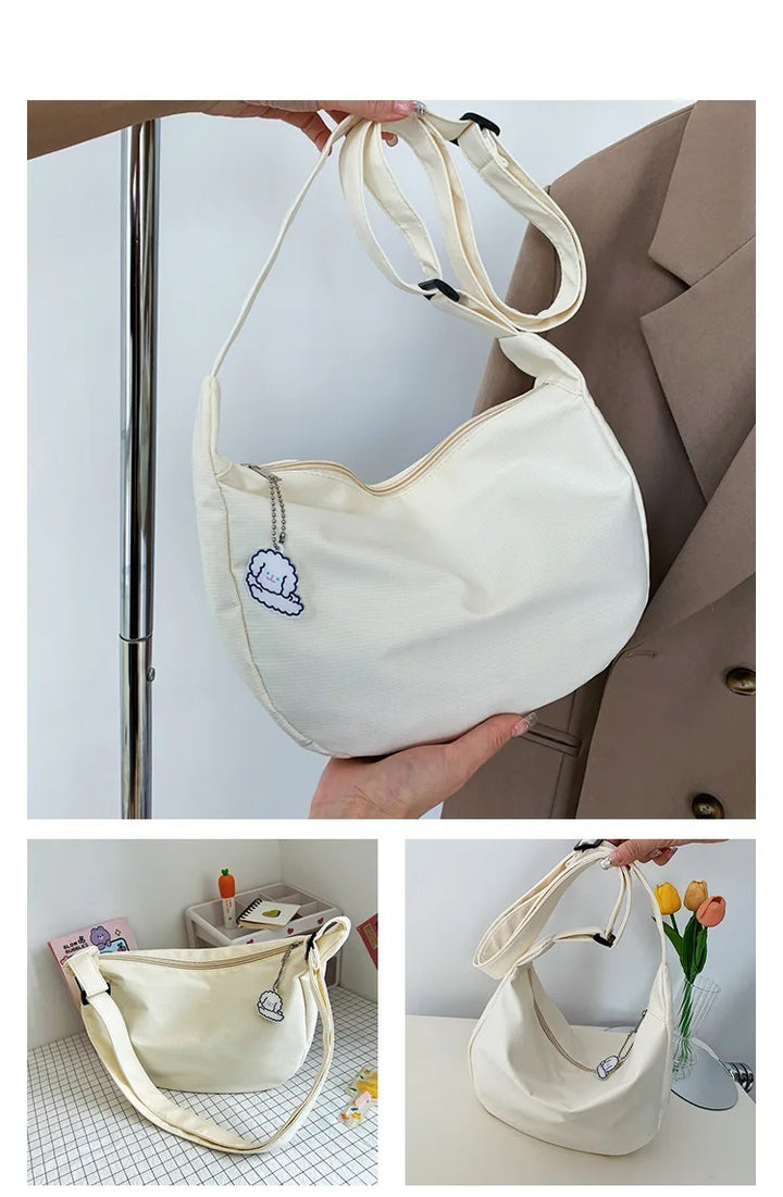 Weiße Umhängetasche aus Segeltuch, lässig, mit Stickerei, modisch, Damenaccessoire.