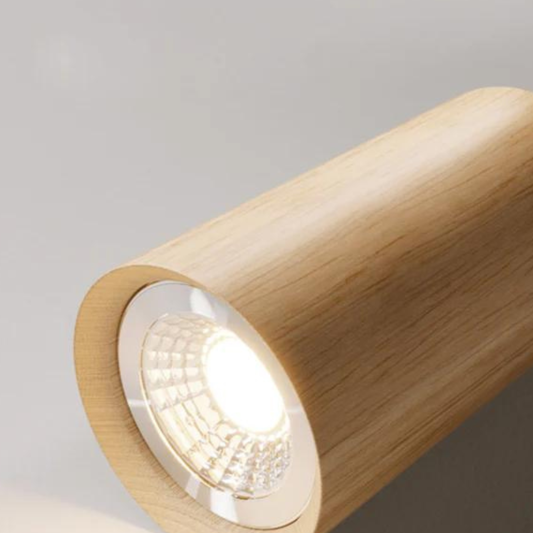 Moderne LED-Deckenleuchte aus Holz, zylindrisch, warmweißes Licht, minimalistisches Design.
