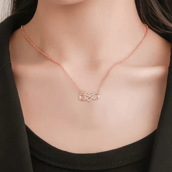 Damen Halskette mit Unendlichkeitsanhänger, Roségold, eleganter Schmuck, Geschenkidee.