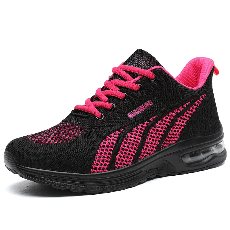 Schwarzer Sportschuh mit pinken Akzenten, atmungsaktiv, Damen Sneaker, rutschfeste Sohle.