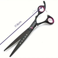 Schwarze Friseurschere 17,8 cm, ergonomisch, mit pinken Griffen und Sternverzierung.