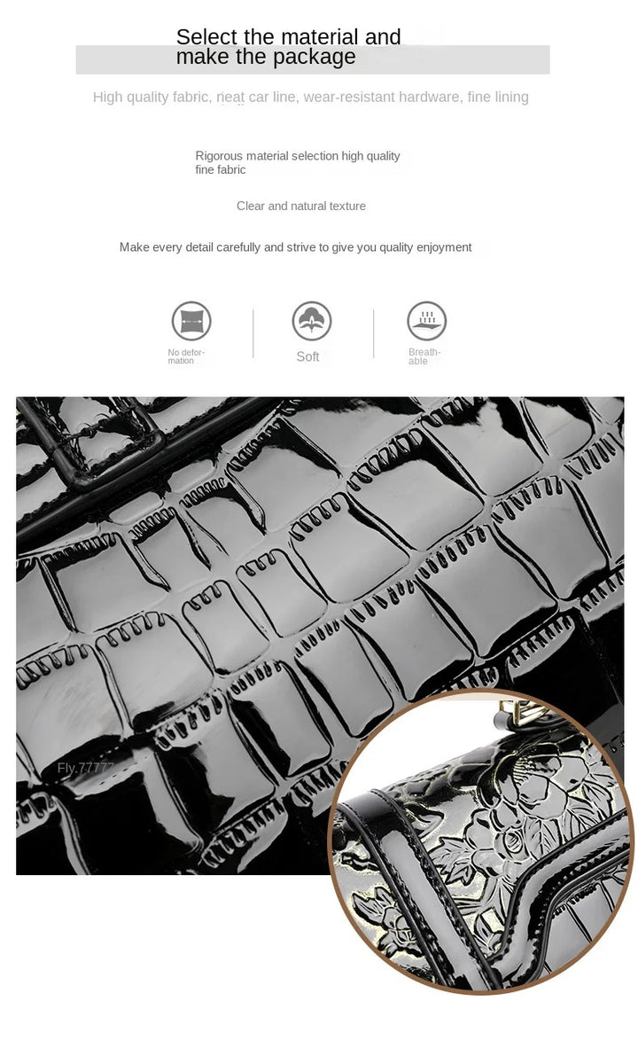 Schwarze Lederhandtasche mit Krokodilprägung, glänzend, elegant, Damenmode-Accessoire.