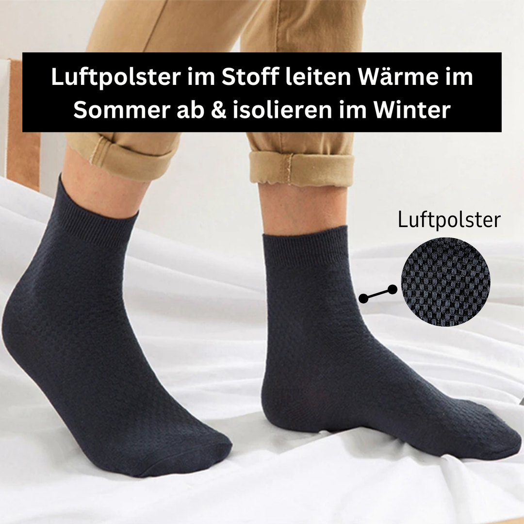 Dunkelblaue Socken mit Luftpolster, atmungsaktiv, isolierend, ideal für Sommer und Winter.