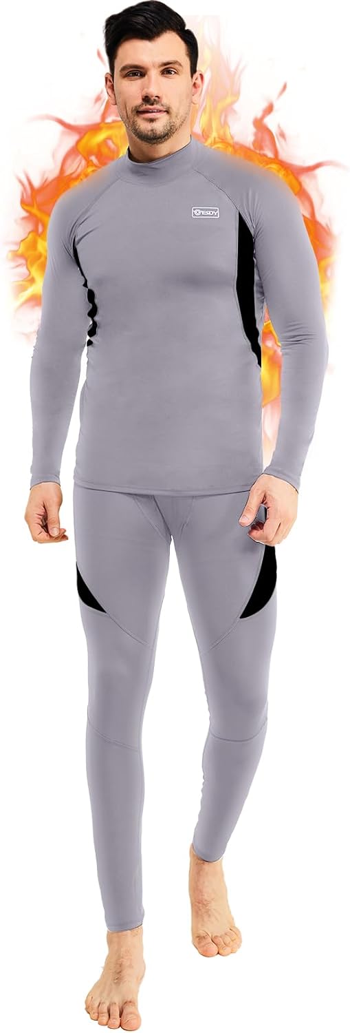 Mann in grauem Thermo-Unterwäsche-Set, langärmelig, ideal für kaltes Wetter, atmungsaktiv.