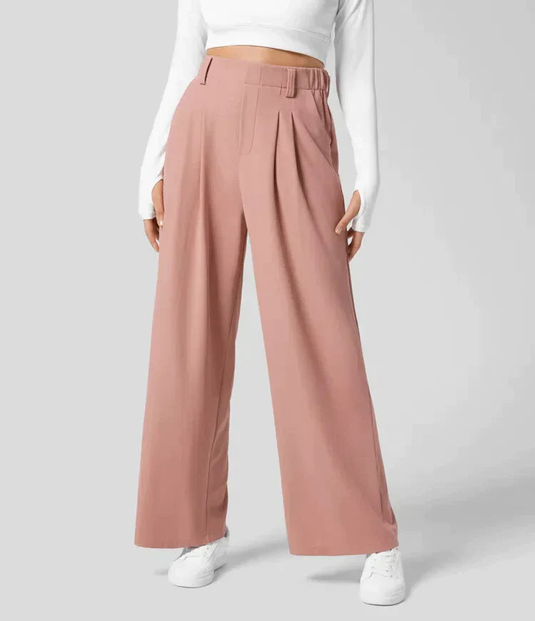 Damenhose, rosa, weit geschnitten, elegant, aus Stoff, modisch, ideal für Büro oder Freizeit.