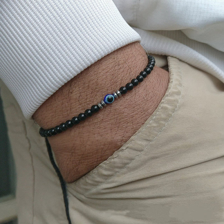 Schwarzes Perlenarmband mit blauem Auge, Herrenmode, handgefertigt, lässiger Schmuck.