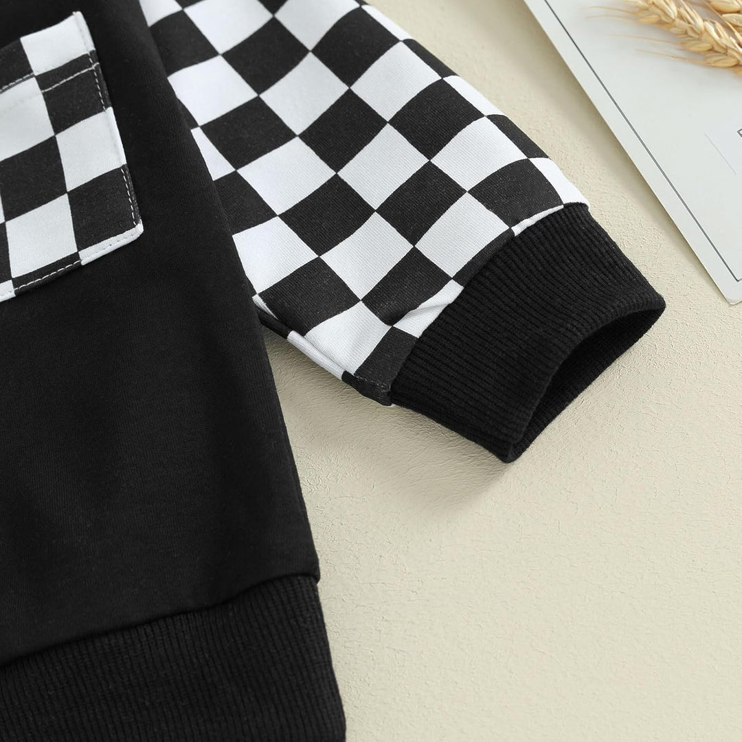 Schwarz-weiß kariertes Langarmshirt aus Baumwolle mit Tasche, Kinderkleidung, modisch.