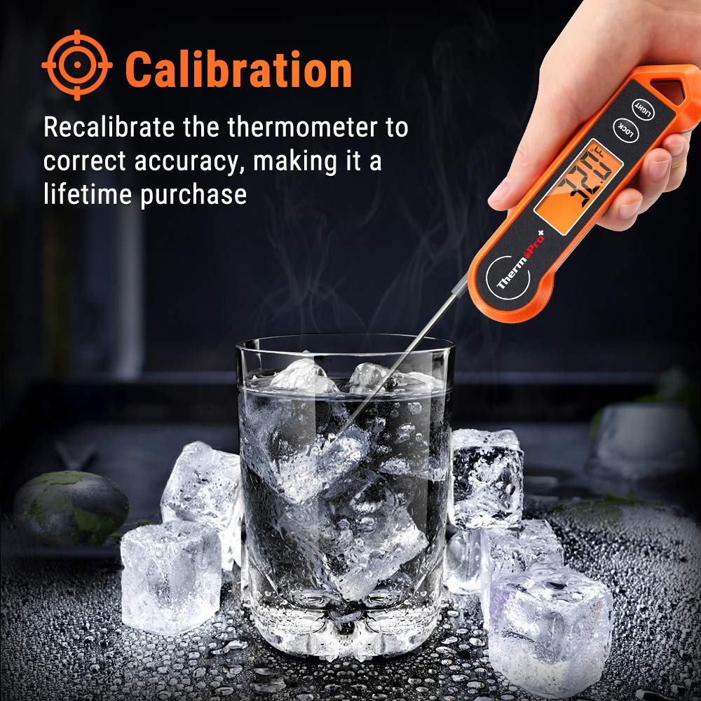 Digitales Küchenthermometer, orange, mit langer Sonde, ideal für präzise Temperaturmessung.