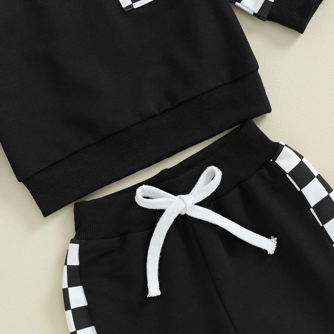 Schwarz-weißes Kinder-Sportset mit Karomuster, Baumwolle, bequem, modisch, Freizeitkleidung.