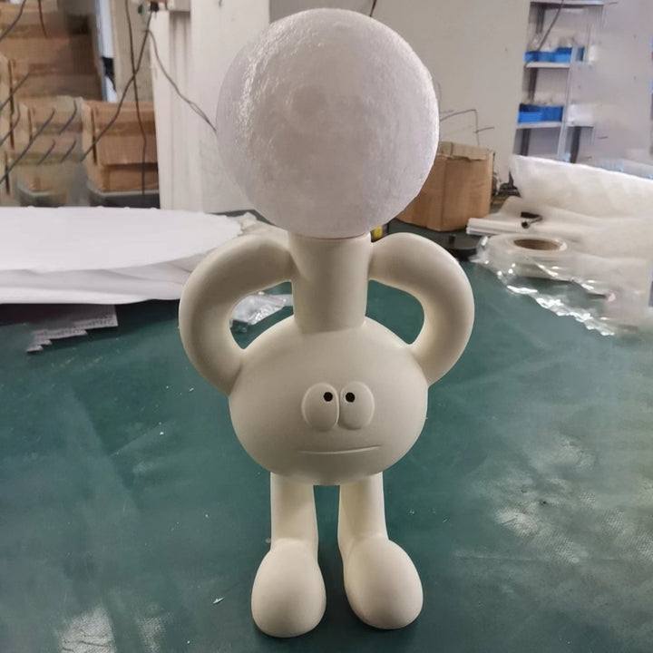 Verspielte Tischlampe mit Glasball - Glombra