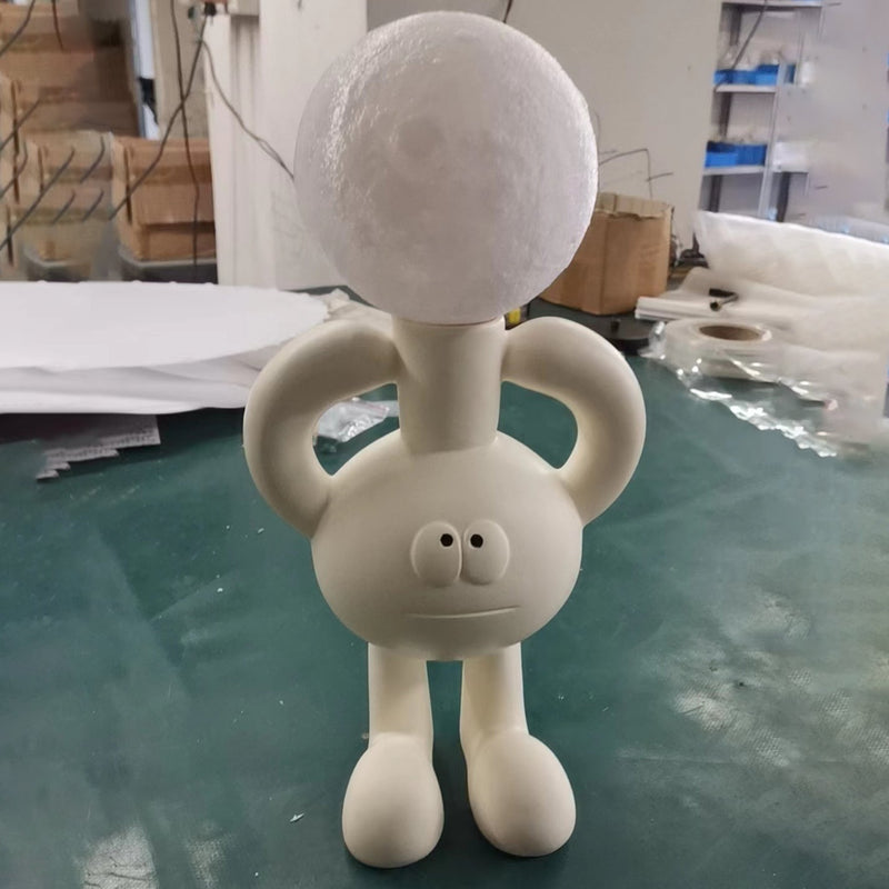 Verspielte Tischlampe mit Glasball - Glombra