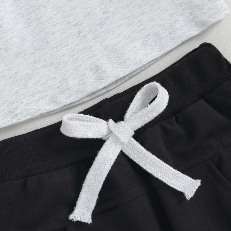 Schwarz-weiße Jogginghose mit Kordelzug, Baumwolle, bequem, Freizeitkleidung für Damen.