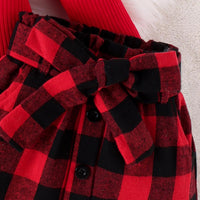 Rot-schwarz kariertes Kinderkleid mit Schleife, Knöpfen, Baumwolle, festlich, modisch.