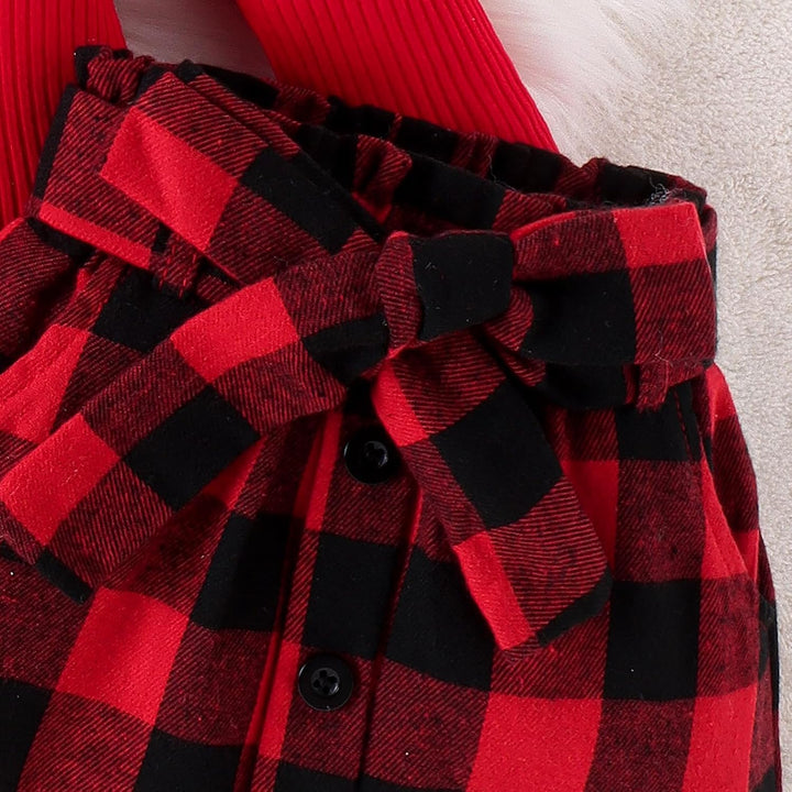 Rot-schwarz kariertes Kinderkleid mit Schleife, Knöpfen, Baumwolle, festlich, modisch.