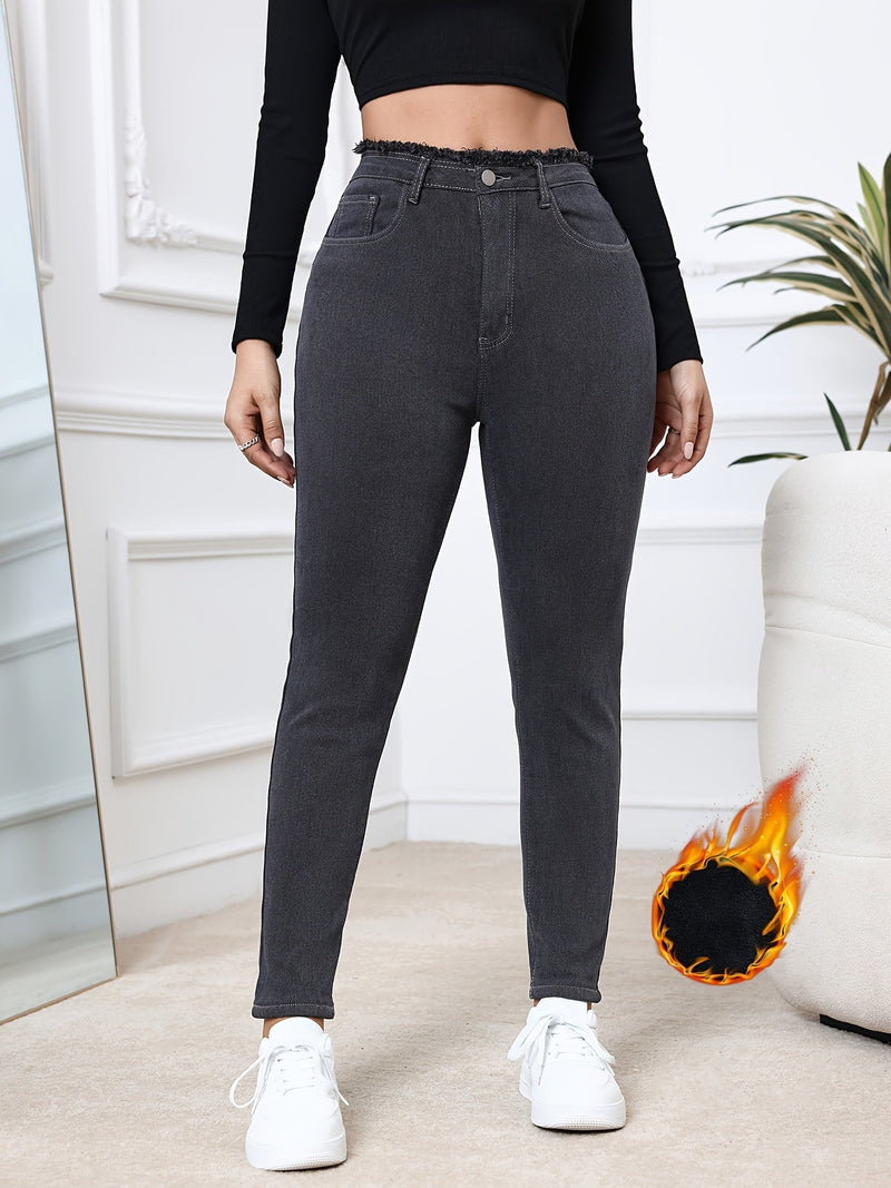 Damen Thermo-Jeans, schwarz, hohe Taille, elastisch, warm, Wintermode, bequem.