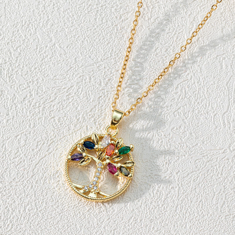 Goldene Lebensbaum-Halskette mit bunten Edelsteinen, elegantes Schmuckstück für Damen.