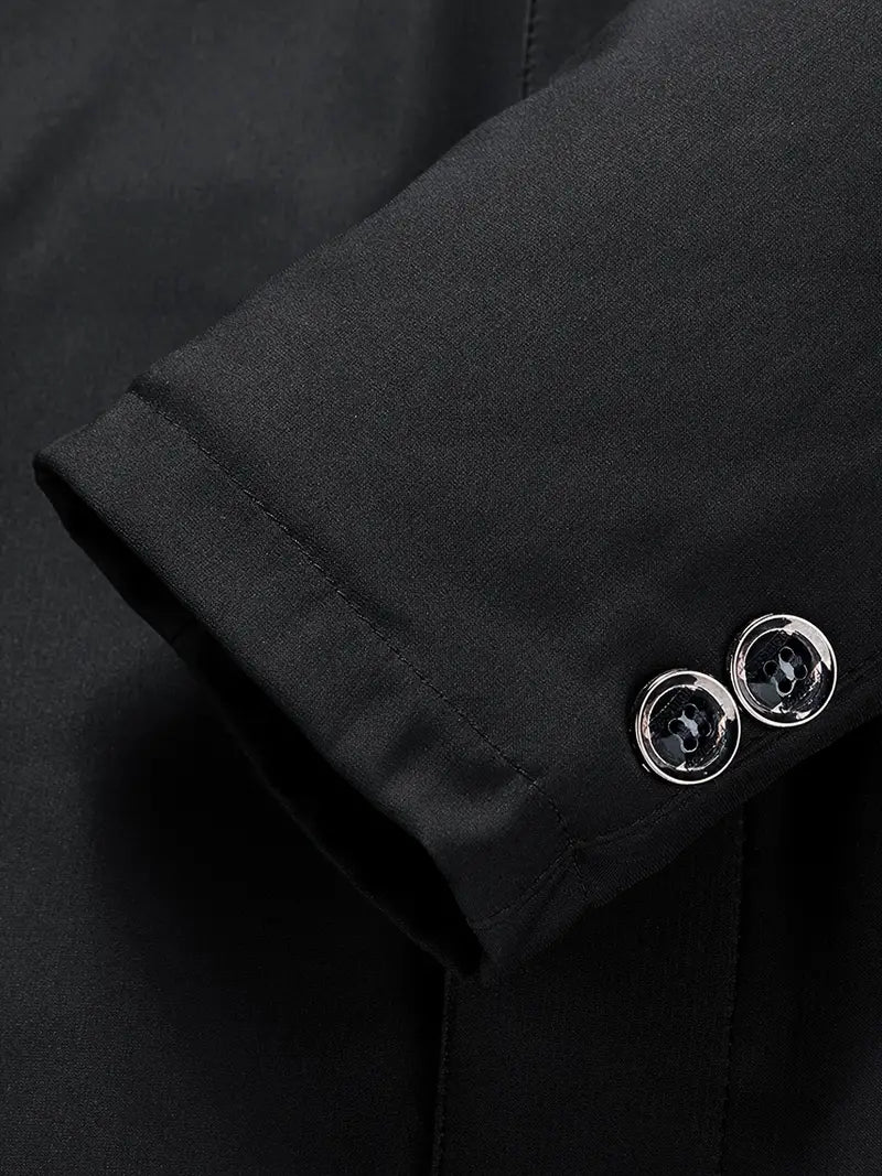Schwarzer Anzugärmel mit silbernen Knöpfen, elegantes Herrenmode-Detail, hochwertige Verarbeitung.