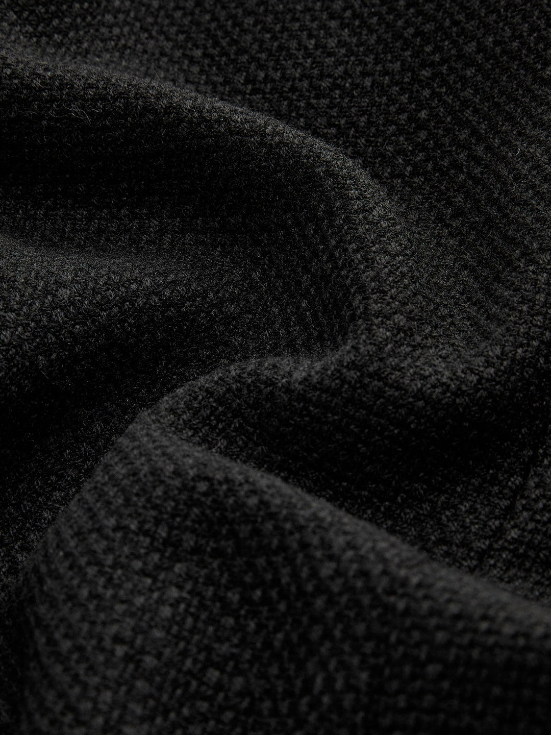 Schwarzer Wollstoff, Nahaufnahme, Textur, hochwertig, weiches Material, Mode, Bekleidung.