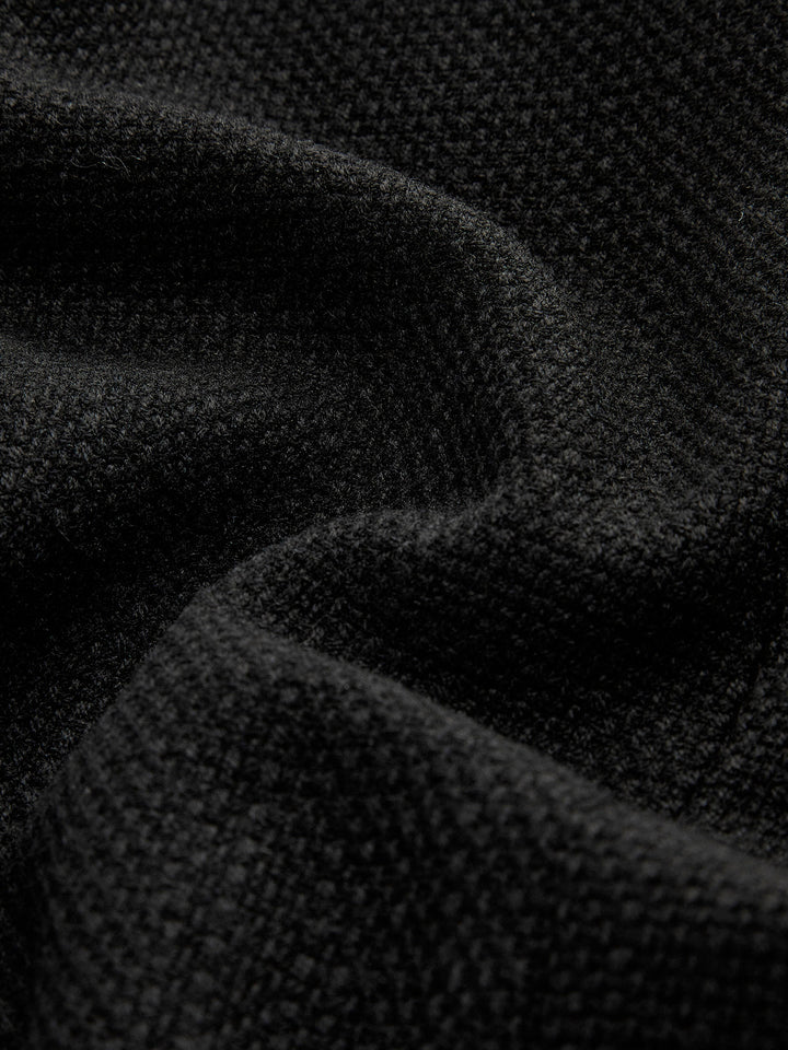 Schwarzer Wollstoff, Nahaufnahme, Textur, hochwertig, weiches Material, Mode, Bekleidung.