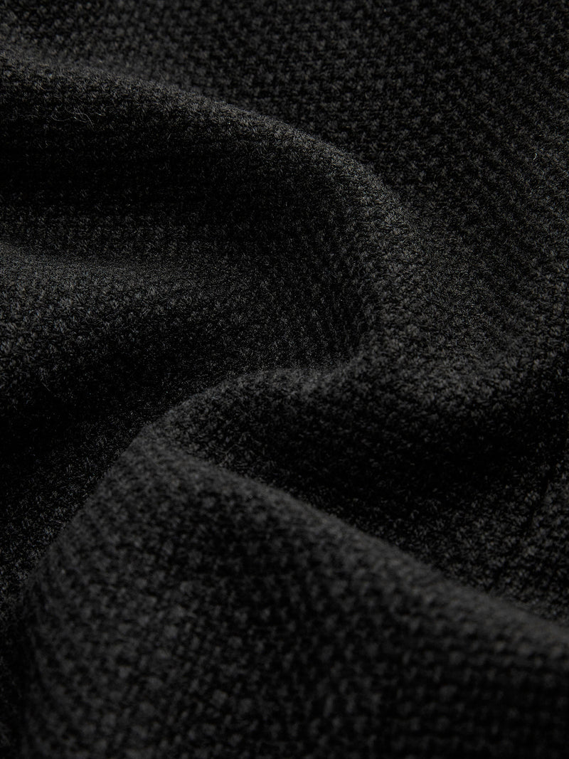 Schwarzer Wollstoff, Nahaufnahme, Textur, hochwertig, weiches Material, Mode, Bekleidung.
