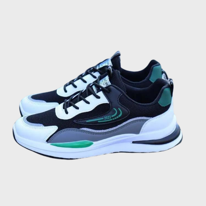 Schwarze Mesh-Sneaker, Herren, sportlich, atmungsaktiv, grün-weiße Akzente, modisch.