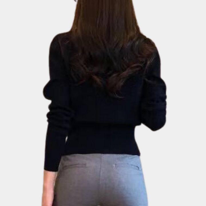 Damenpullover schwarz, langärmelig, Strick, modisch, elegant, Rückansicht, Herbstmode.