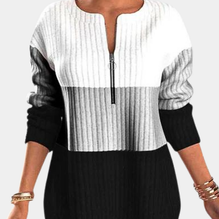 Schwarz-weiß gestreifter Damenpullover mit Reißverschluss, langärmelig, modisch.
