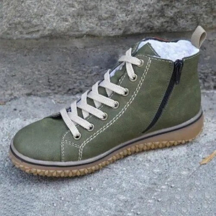 Grüner Damen-Sneaker mit Reißverschluss, Leder, rutschfeste Sohle, bequem, modisch.