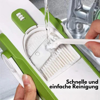 Grüner Gemüseschneider mit Wasserstrahl, einfache Reinigung, Küchengerät, Kunststoff.