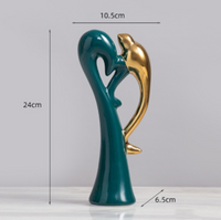 Grüne und goldene Keramik-Vogelskulptur, 24 cm, moderne Deko, elegantes Design.