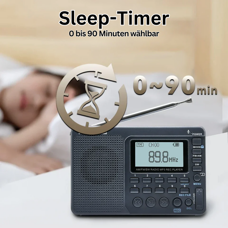 Schwarzes tragbares Radio mit Sleep-Timer, 0-90 Minuten, auf Nachttisch neben schlafender Person.