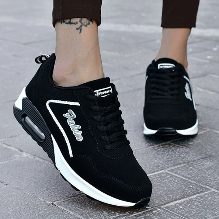 Schwarze Damen-Sneaker, leicht, wasserdicht, atmungsaktiv, ideal für Sport und Freizeit.