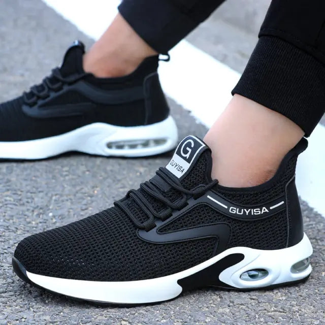 Schwarze GUYISA Sicherheitsschuhe, atmungsaktiv, rutschfest, mit weißer Sohle, Unisex.