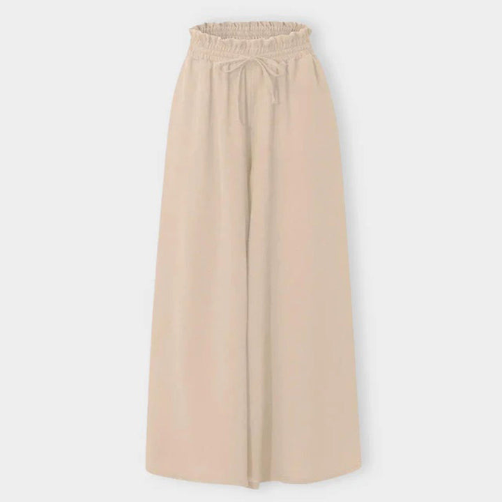 Beige Damenhose, weites Bein, elastischer Bund, modisch, bequem, ideal für Freizeitkleidung.