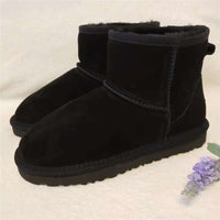 Schwarze Damen-Winterstiefel aus Wildleder, warm gefüttert, rutschfeste Sohle.
