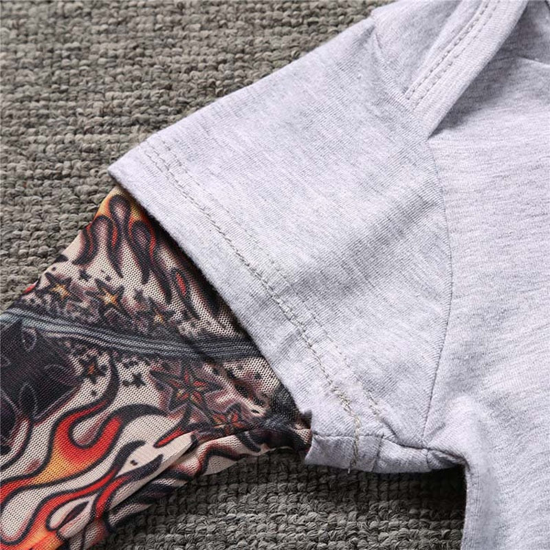 Langarm-Babybody mit Tattoo-Ärmel im Druckdesign – Rockbaby