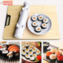 Sushi-Roll-Maker auf Holzbrett mit fertigen Sushi-Rollen, ideal für DIY-Sushi-Zubereitung.