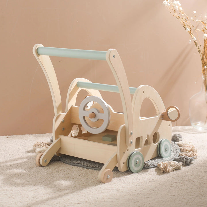Lauflernwagen aus Holz mit Montessori-Spielteilen und Spiegeln