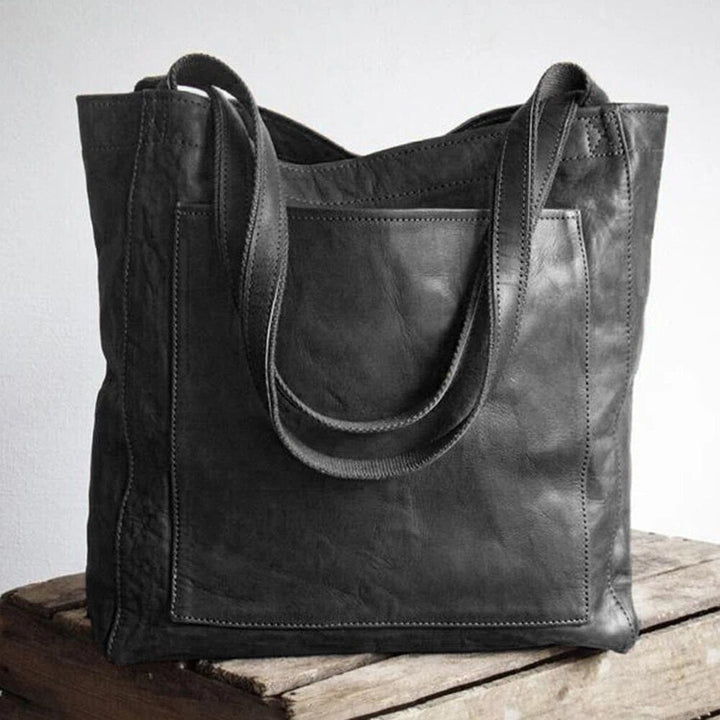 Schwarze Leder-Schultertasche, Vintage-Stil, große Handtasche, modisch und elegant.