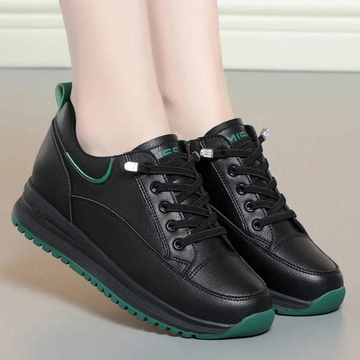 Schwarze Damen-Ledersneaker, feuerfest, wasserdicht, grüne Sohle, modisch, bequem.