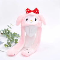 Rosa Plüschmütze mit Hasenohren und roter Schleife, kawaii Design, Geschenkidee.